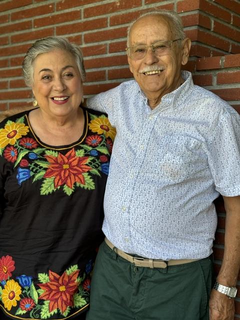 Susana's parents, smiling together